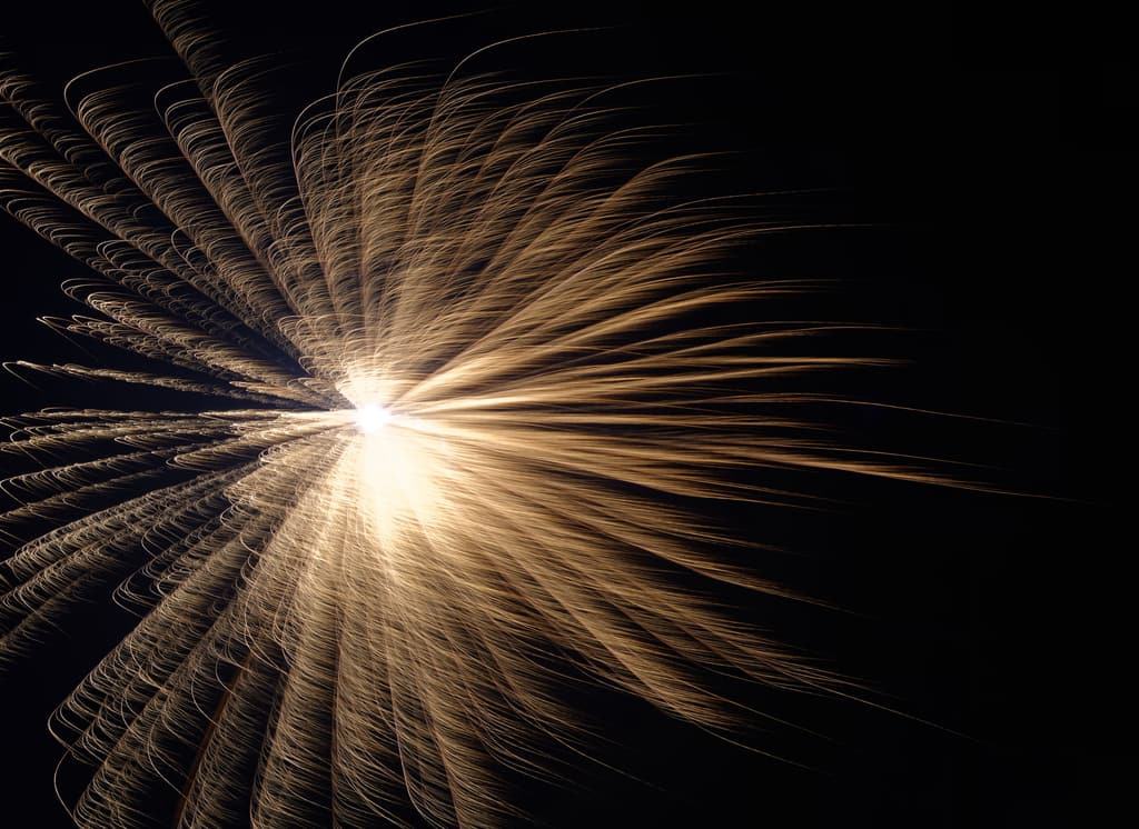 Golden fireworks bursting across the night sky during Deepavali